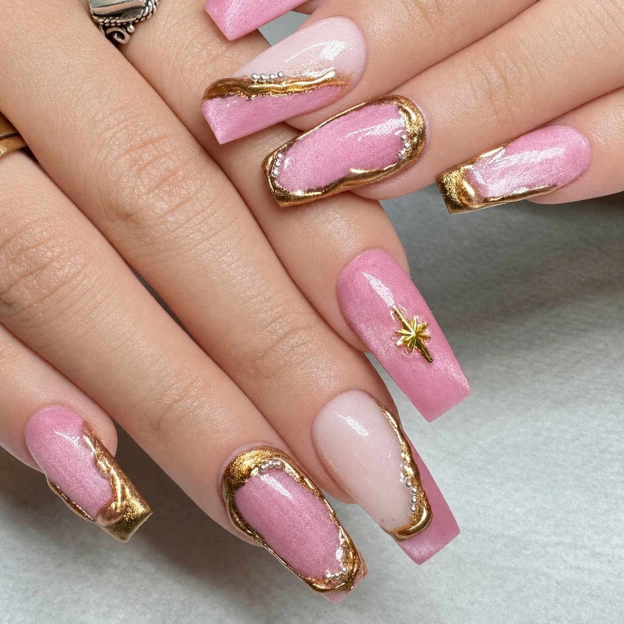 Pink and gold manicure by Blackrock Nails & Spa