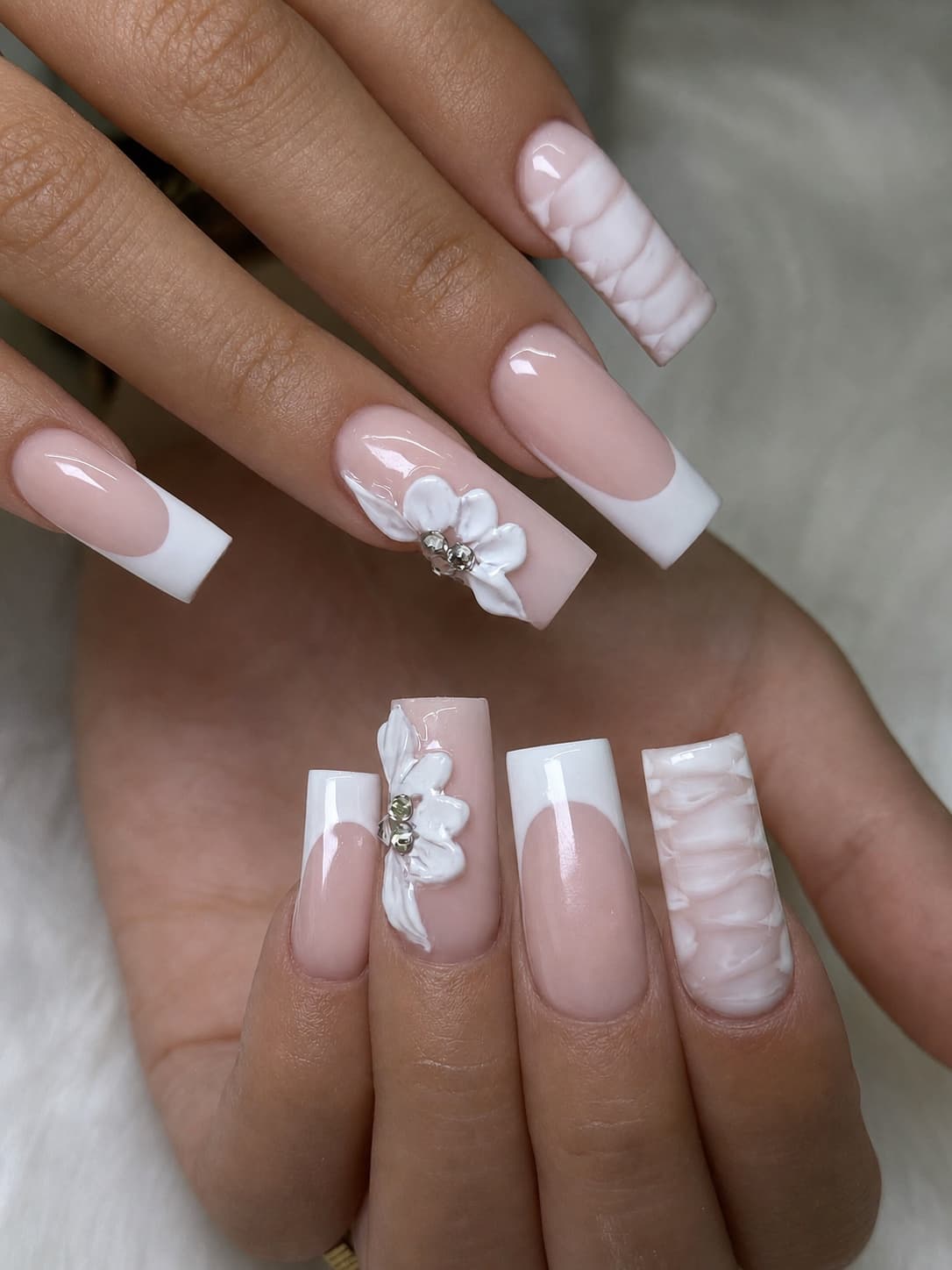 White floral French manicure by Blackrock Nails & Spa