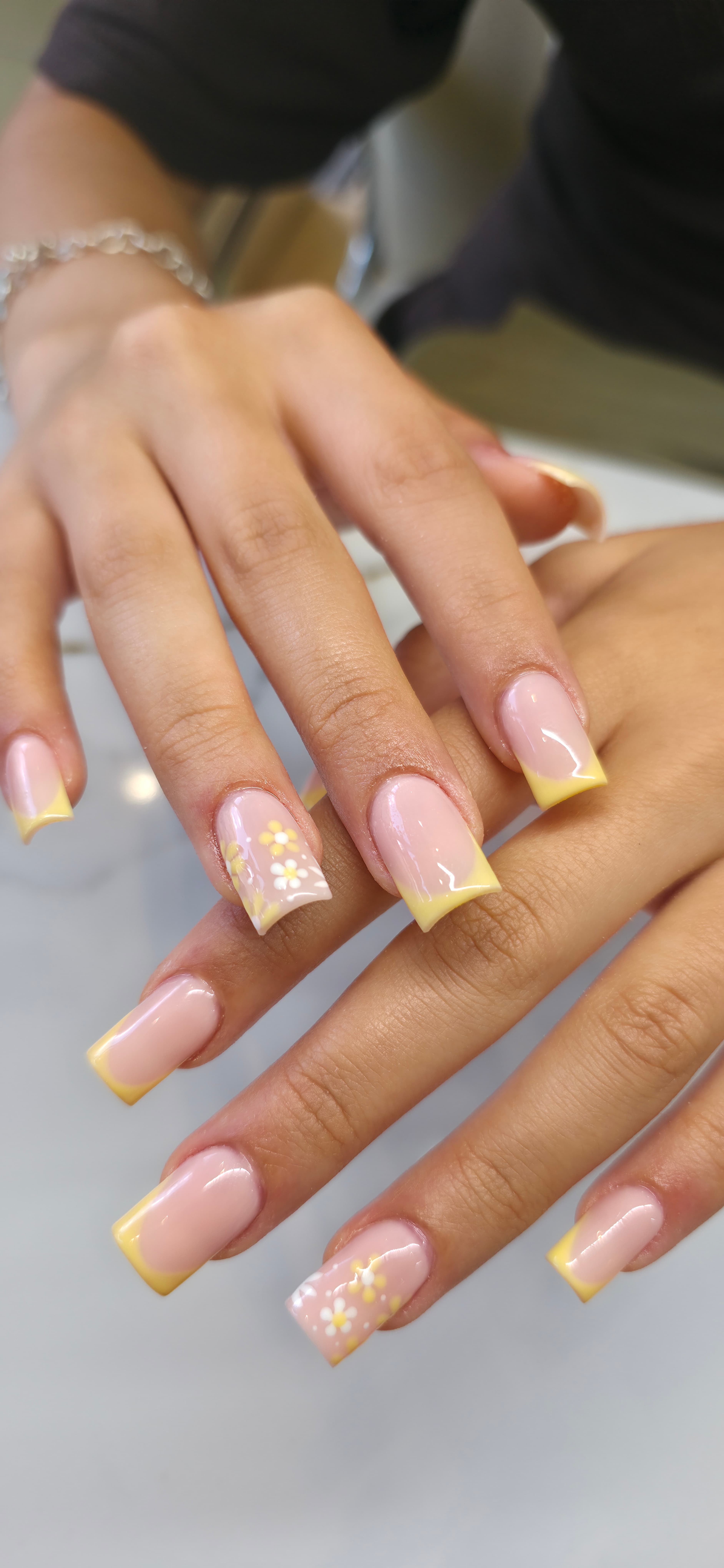 Yellow French floral manicure by Blackrock Nails & Spa